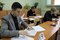 Дмитрий Шулаков выполняет задание олимпиады